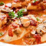 Paleo honey dijon chicken with bacon, mushrooms and sun-dried tomatoes