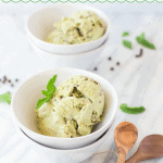 mint chip ice cream in two small white bowls
