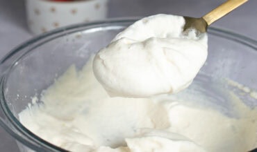 whipped cream in mixing bowl