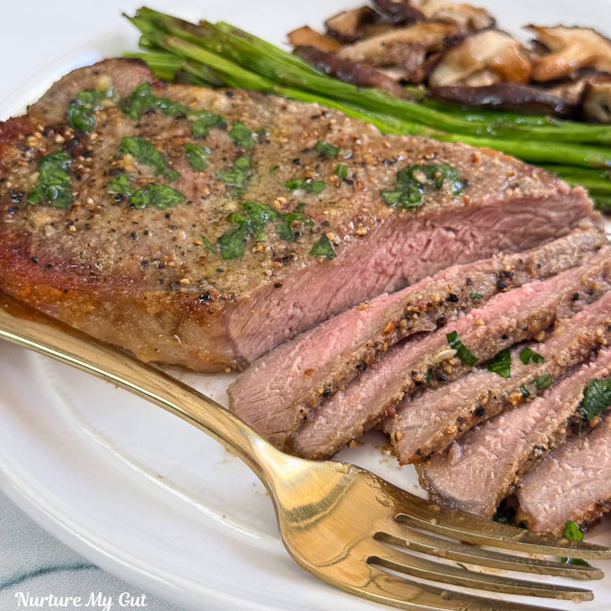 sliced steak on a plate