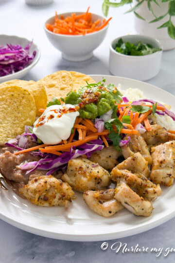Close-up of crispy Air Fryer Chicken Bites made in the Ninja Crispi Air Fryer, golden brown, juicy, and seasoned with garlic and onion spices, served fresh for a quick high-protein meal.